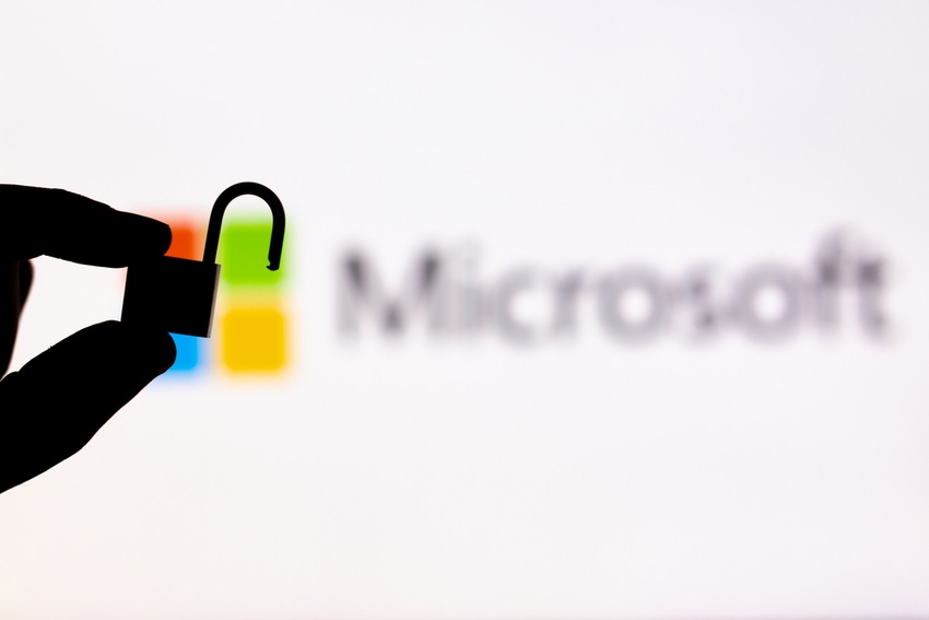 Concept illustration showing unlocked padlock beside a Microsoft logo
