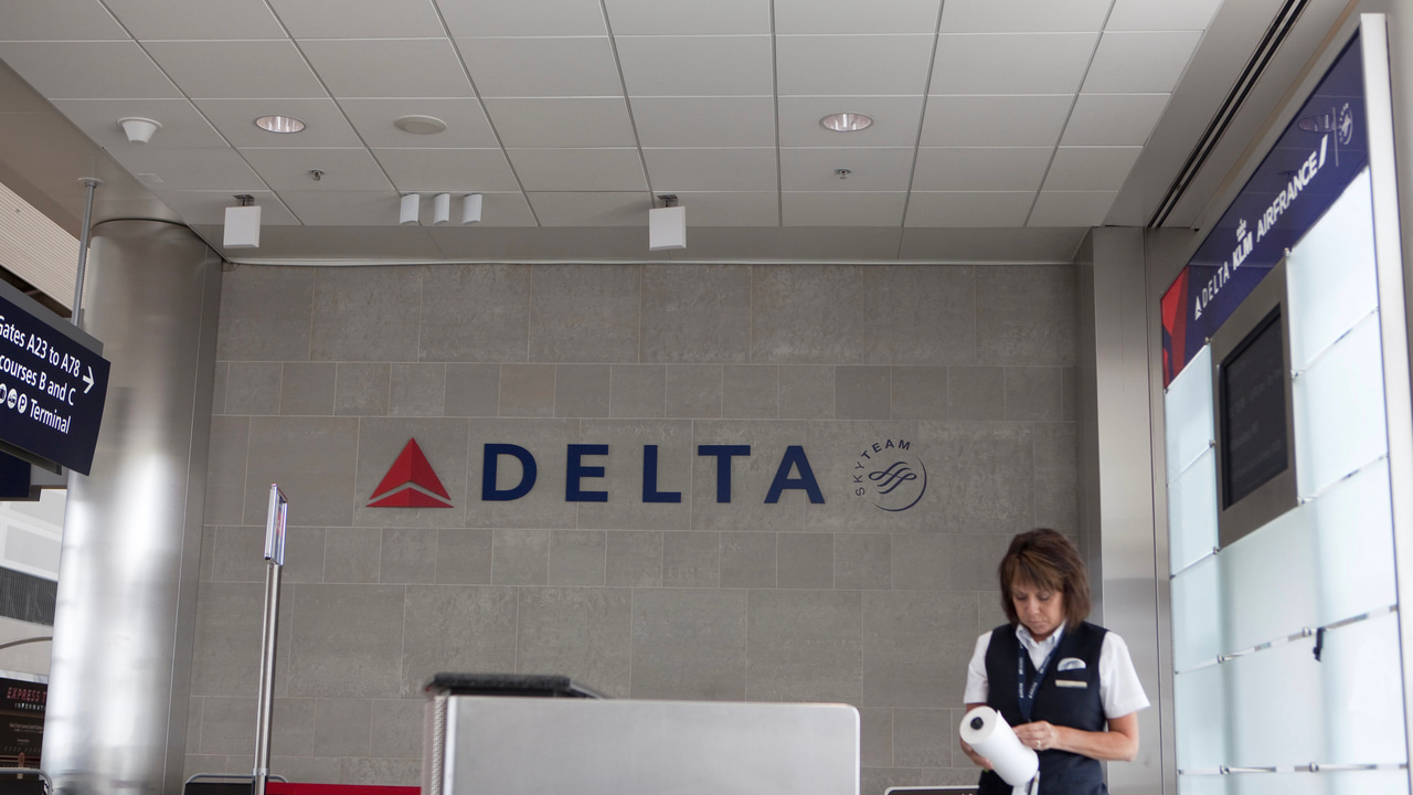 Delta Airlines logo at a Detroit Metropolitan Wayne County Airport gate Delta Airlines logo at a Detroit Metropolitan Wayne County Airport gate