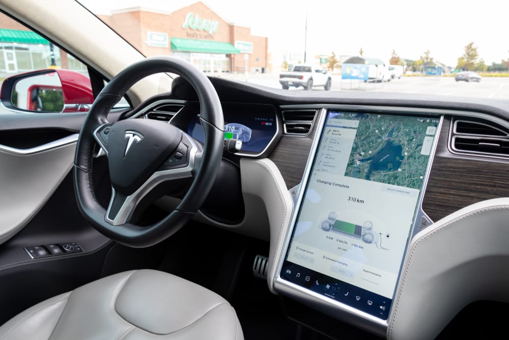 Tesla Model S interior seen while charging at a Tesla Supercharger location. Tesla Model S interior seen while charging at a Tesla Supercharger location.