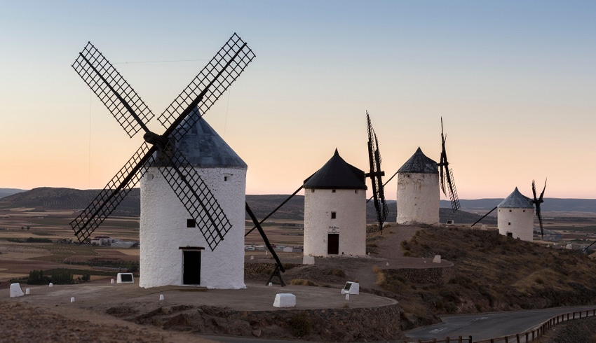 Preserved historic La Mancha windmills on hilltop above Consuegra in Castilla-La Mancha, Spain Preserved historic La Mancha windmills on hilltop above Consuegra in Castilla-La Mancha, Spain