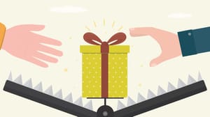 Two hands reaching for a package sitting in a bear trap. Two hands reaching for a package sitting in a bear trap.