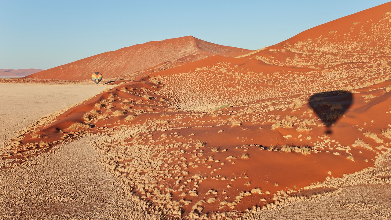 Shadow of hot-air balloon over the Namib desert. Namib-Naukluft Park, Namibia Shadow of hot-air balloon over the Namib desert. Namib-Naukluft Park, Namibia