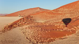 Shadow of hot-air balloon over the Namib desert. Namib-Naukluft Park, Namibia Shadow of hot-air balloon over the Namib desert. Namib-Naukluft Park, Namibia