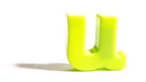 An undercase, lime green-colored 'u' An undercase, lime green-colored 'u'