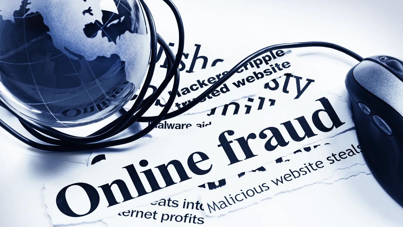 An image of a globe with a keyboard mouse with the words "Online Fraud" An image of a globe with a keyboard mouse with the words "Online Fraud"