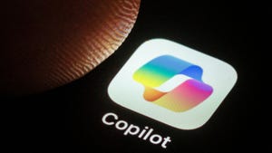 A finger hovering over a Microsoft Copilot app icon A finger hovering over a Microsoft Copilot app icon