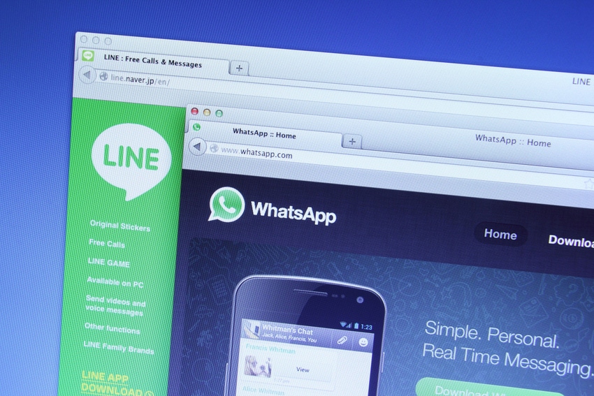 Line and WhatsApp chat application windows displayed on computer screen