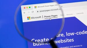 Microsoft Power Pages' website, under a magnifying glass Microsoft Power Pages' website, under a magnifying glass