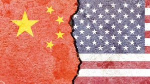 Two cracked flags US and China Two cracked flags US and China