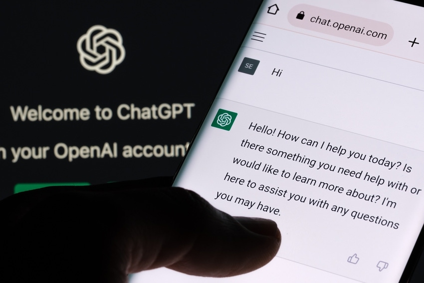 Open AI chatbox on a phone screen with ChatGPT screen in the background