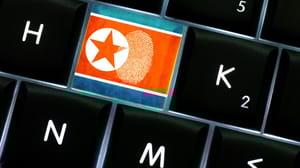 A keyboard with a North Korea flag key, with a fingerprint on the key A keyboard with a North Korea flag key, with a fingerprint on the key
