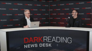 Two people talking at a news desk against a dark backdrop with "Dark Reading" written on it. Two people talking at a news desk against a dark backdrop with "Dark Reading" written on it.