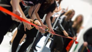 Photo of a ribbon-cutting ceremony at a store grand opening