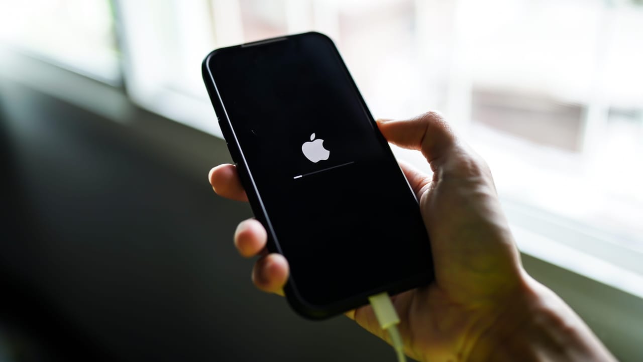 An Apple iPhone updating An Apple iPhone updating