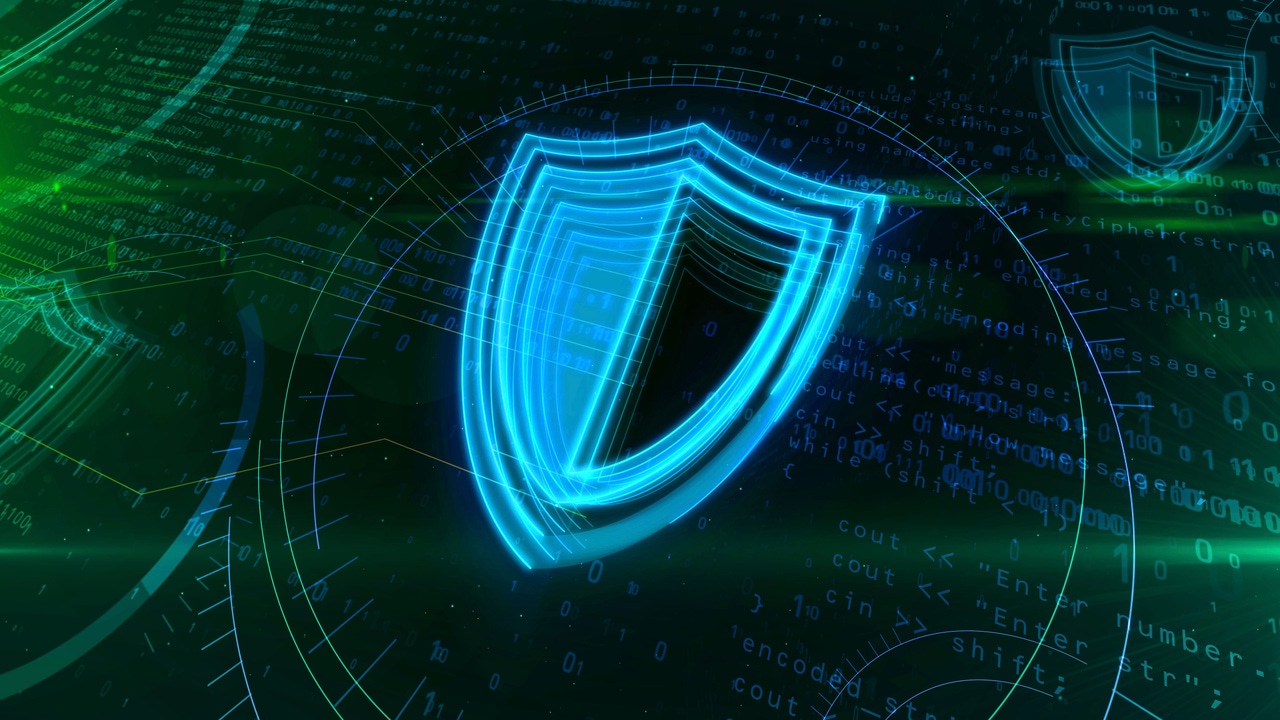 Glowing blue shield icon hovering in front of a dark background with green and blue code Glowing blue shield icon hovering in front of a dark background with green and blue code