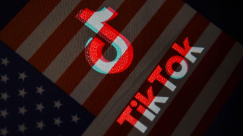 TikTok logo projected onto an American flag background