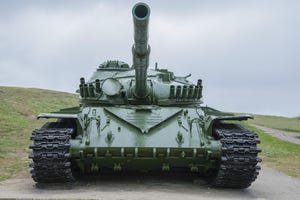 Tank T-72 facing the camera under a cloudy sky