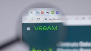 A magnifying glass hovering over the Veeam logo on its webpage A magnifying glass hovering over the Veeam logo on its webpage