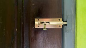 A wooden door slot lock, latch, or slot lock A wooden door slot lock, latch, or slot lock