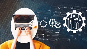 Woman on laptop with digital automated gears Woman on laptop with digital automated gears