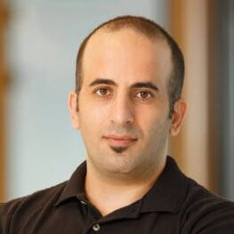Dotan Nahum of Check Point Software has buzzed dark hair and wears a black polo shirt.