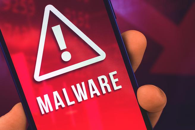 Image of a mobile phone screen with a warning of malware