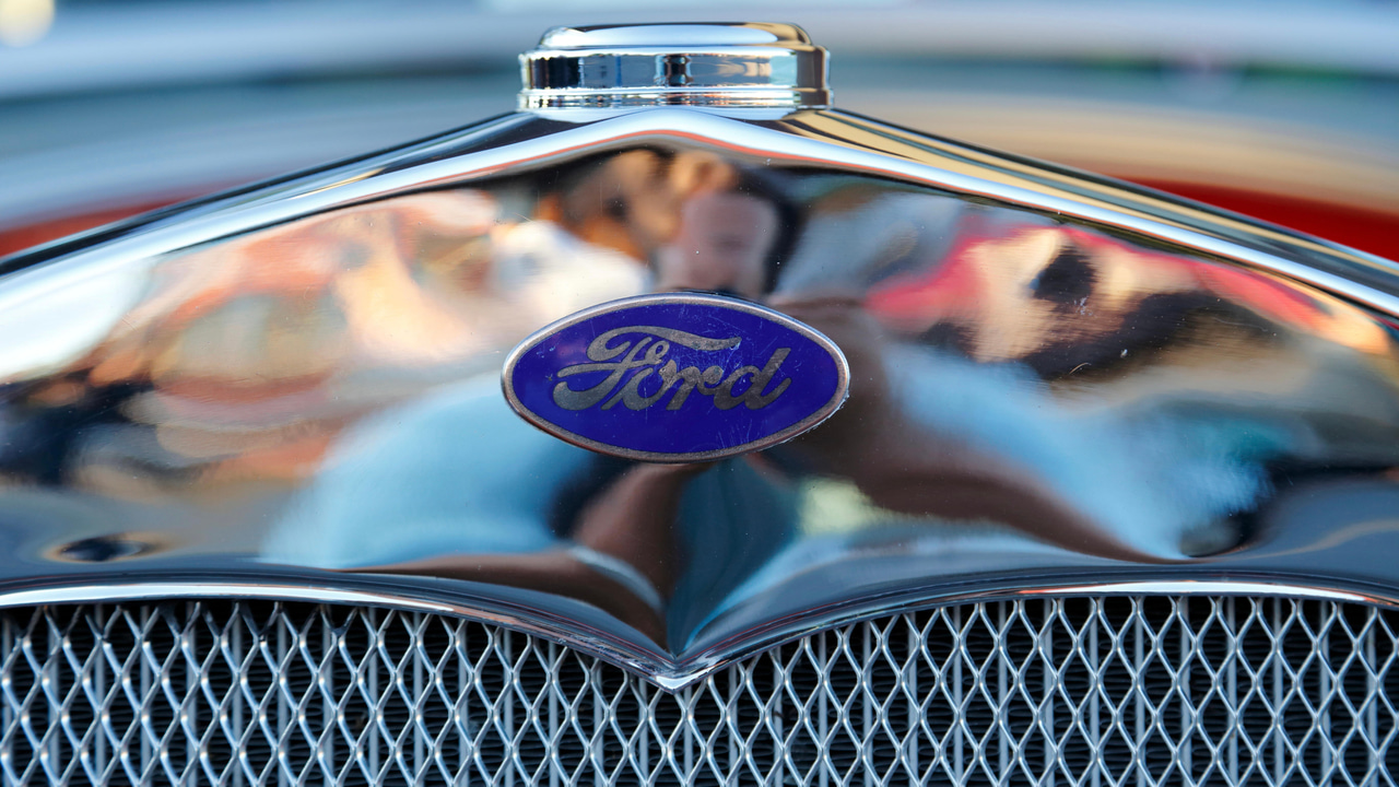 Ford logo on radiator of an antique car Ford logo on radiator of an antique car