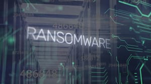 A word Ransomware imposed over a circuit board A word Ransomware imposed over a circuit board