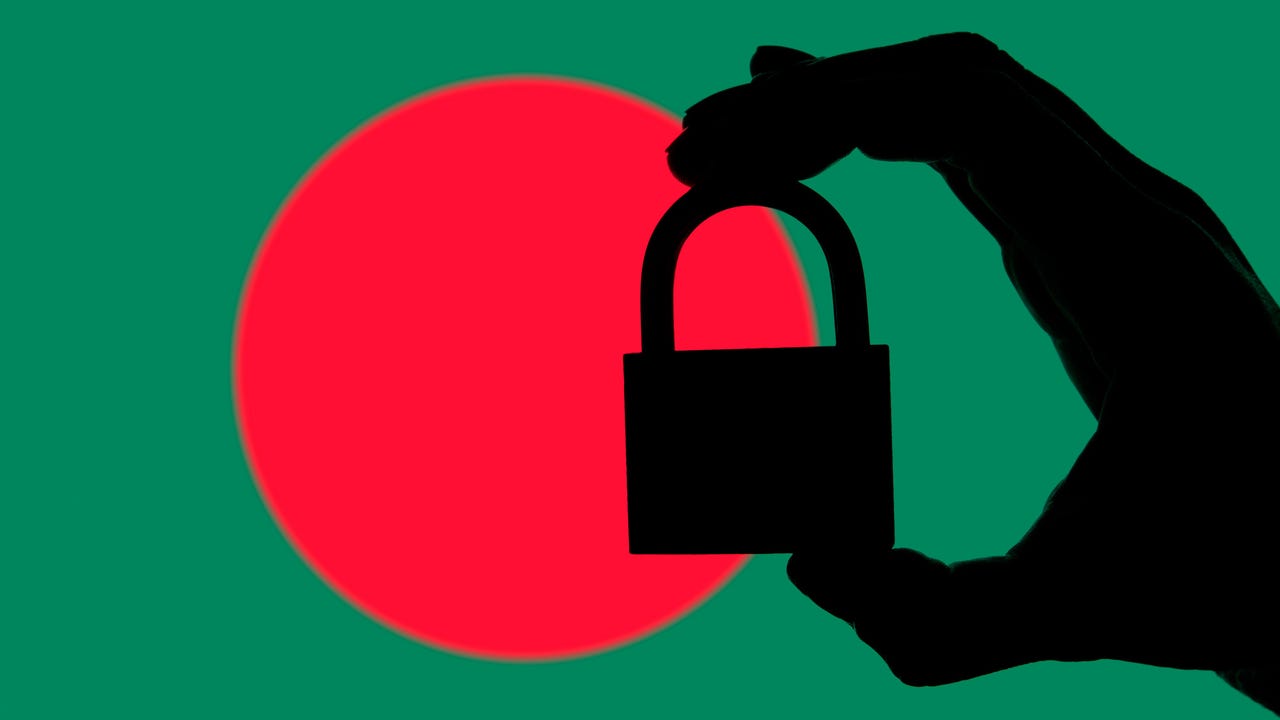 A hand holding a padlock in front of a graphic of the flag of Bangladesh A hand holding a padlock in front of a graphic of the flag of Bangladesh