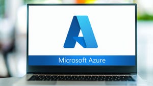Photo of a laptop whose screen displays the Microsoft Azure logo