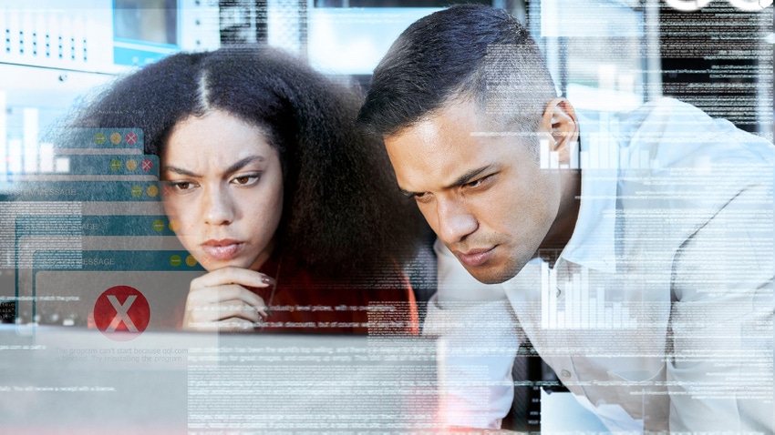 Two coworkers frown as they troubleshoot a programming project together amid error messages