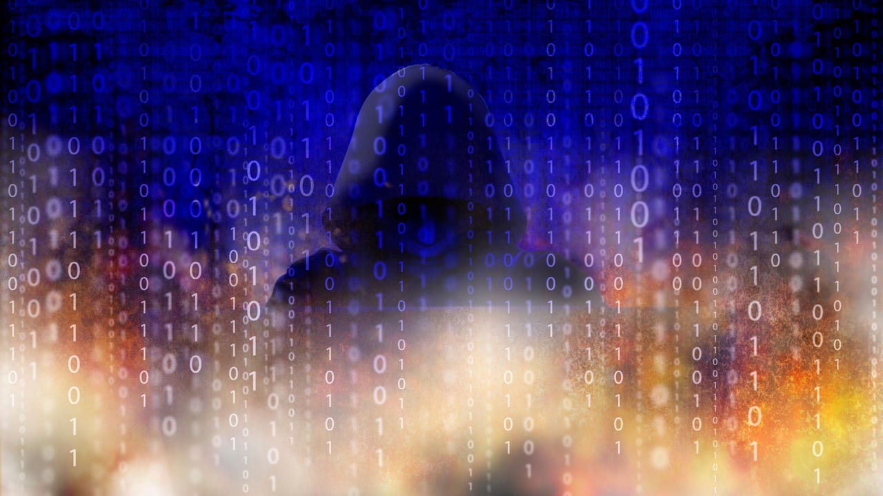 Concept illustration of a shadowy hacker breaking into a computer Concept illustration of a shadowy hacker breaking into a computer