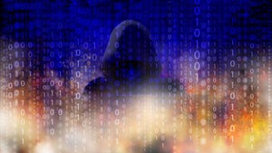 Concept illustration of a shadowy hacker breaking into a computer Concept illustration of a shadowy hacker breaking into a computer