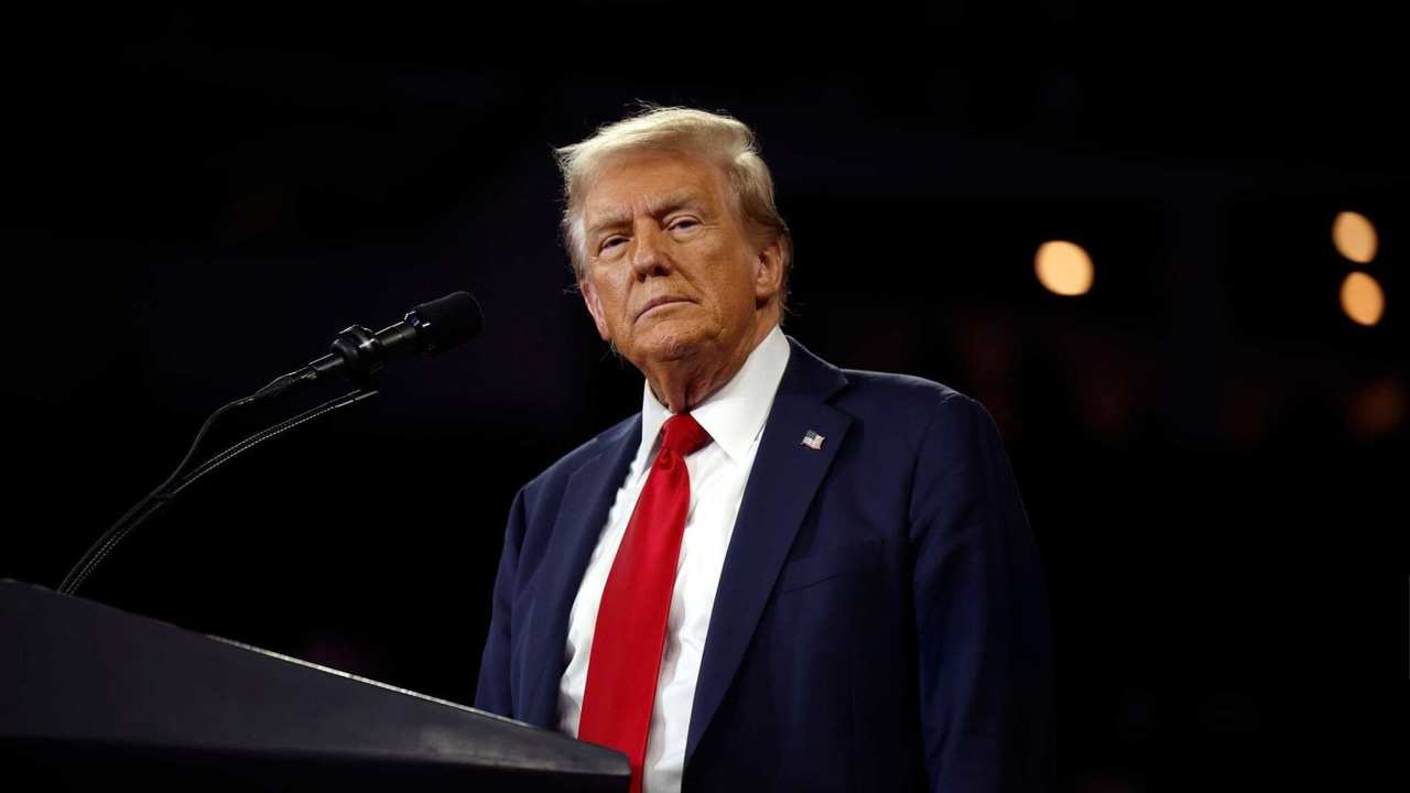 Donald Trump standing at a podium Donald Trump standing at a podium