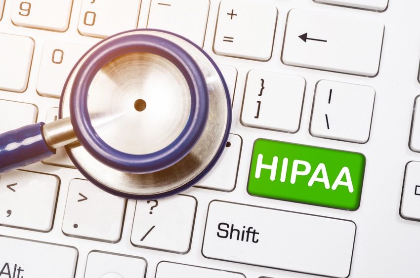 Stethoscope placed on a keyboard whose Enter key has been labeled HIPAA
