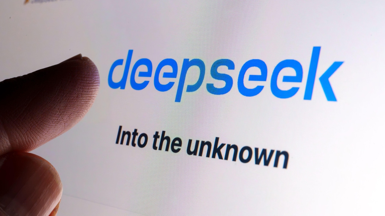 A finger touching DeepSeek's logo on a screen A finger touching DeepSeek's logo on a screen