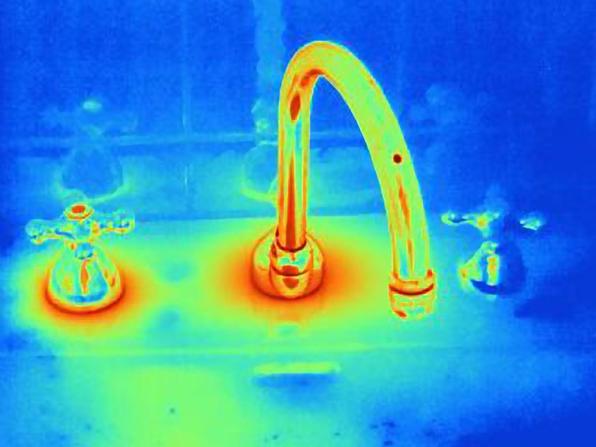 Sink showing the thermal effect of the hot and cold water taps