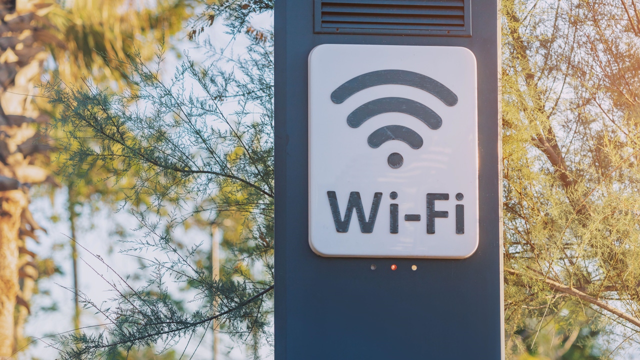 An outdoor sign showing Wi-Fi availability.  An outdoor sign showing Wi-Fi availability.