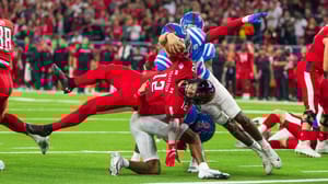Texas Tech Red Raiders quarterback Tyler Shough and Ole Miss Rebels linebacker Khari Coleman (23) collide at the goal line Texas Tech Red Raiders quarterback Tyler Shough and Ole Miss Rebels linebacker Khari Coleman (23) collide at the goal line