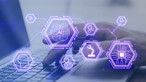 A hand at a keyboard overlaid with an AI graphic A hand at a keyboard overlaid with an AI graphic