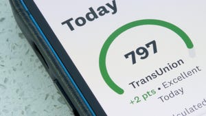 TransUnion credit score is seen from the Credit Karma app on the screen of an iPhone TransUnion credit score is seen from the Credit Karma app on the screen of an iPhone