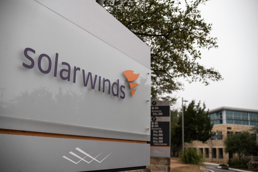 Photo of SolarWinds corporate signage outside an office park