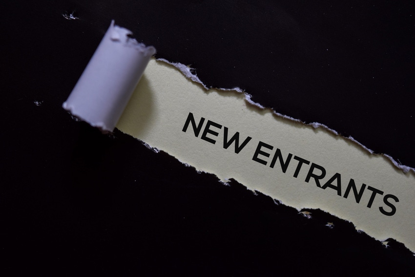 The phrase "New Entrants" written on torn paper