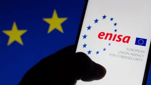 European Union Agency for Cybersecurity (ENISA) logo seen displayed on a smartphone and in the background the European Union (EU) flag.