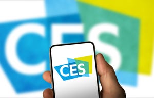 CES Logo on a phone screen and in the background