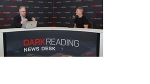Two people talking at a news desk against a dark backdrop with "Dark Reading" written on it. Two people talking at a news desk against a dark backdrop with "Dark Reading" written on it.