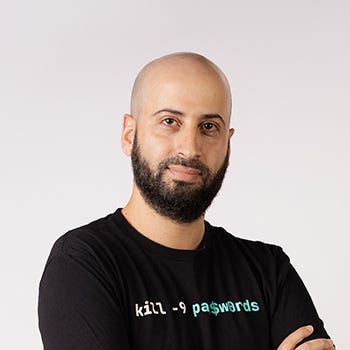 Meir Wahnon, co-founder of Descope, has a shaved head, dark beard, and black t-shirt that wants to kill passwords
