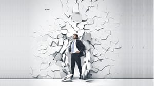 person in a dark suit and beard breaking out of a white wall person in a dark suit and beard breaking out of a white wall