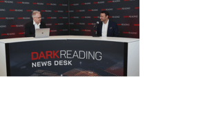 Two people talking at a news desk against a dark backdrop with "Dark Reading" written on it. Two people talking at a news desk against a dark backdrop with "Dark Reading" written on it.