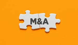 Puzzle pieces fitting together and labeled "M&A"; orange-yellow background